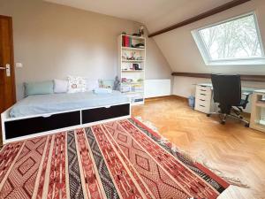 Villa Massenet - Paris 2024 Olympics tesisinde bir odada yatak veya yataklar
