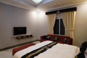 The Barcelo hotel的电视和/或娱乐中心