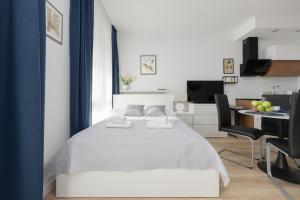 Posteľ alebo postele v izbe v ubytovaní Sarmacka 25 studio 1 close to Medicover and Paley