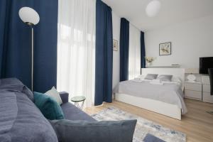 Posteľ alebo postele v izbe v ubytovaní Sarmacka 25 studio 1 close to Medicover and Paley