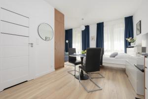Posteľ alebo postele v izbe v ubytovaní Sarmacka 25 studio 1 close to Medicover and Paley