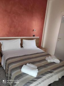 Ein Bett oder Betten in einem Zimmer der Unterkunft Hotel Prestige 3 Stars