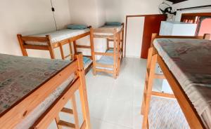 Letto o letti in una camera di Sagui Hostel