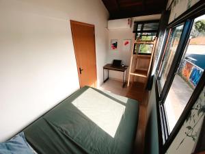Letto o letti in una camera di Sagui Hostel