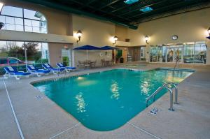 a large swimming pool in a building at Homewood Suites by Hilton Buffalo/Airport in Cheektowaga