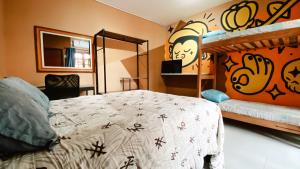 Postel nebo postele na pokoji v ubytování Sagui Hostel
