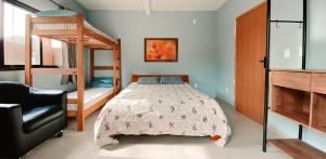 Letto o letti in una camera di Sagui Hostel