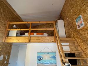 a bedroom with two bunk beds in a room at Studio Cosy Mezzanine in Talence