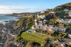 an aerial view of a house on a cliff at Watersmeet Hotel in Woolacombe