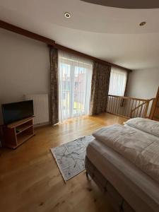 Postel nebo postele na pokoji v ubytování Apartment Weisses Lamm