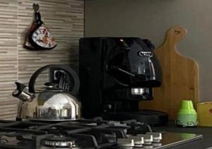 A kitchen or kitchenette at Momenti e Monumenti