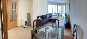 Posezení v ubytování MAGNIFICO ATICO-DUPLEX FRENTE AL MAR