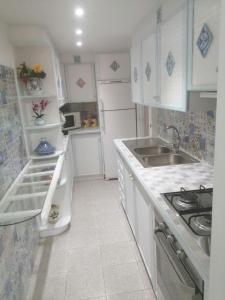 Kuchyň nebo kuchyňský kout v ubytování Casa del Conte