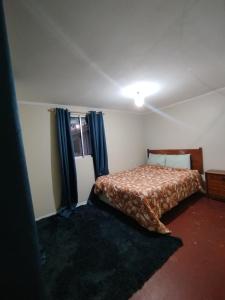 Кровать или кровати в номере Molino Rojo Hostel