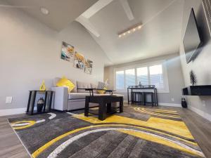 a living room with a couch and a table at 1BD Modern Venice Beach 12A in Los Angeles