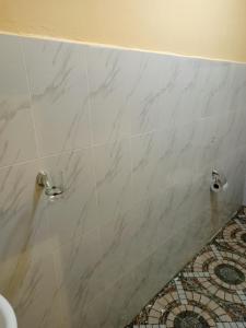 Koupelna v ubytování THE MARA RESORT + 68 fotografií