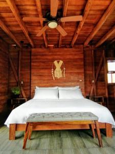 Postel nebo postele na pokoji v ubytování Ecoco Holbox - EcoChic - Cabañas de Madera - Holbox Retreat