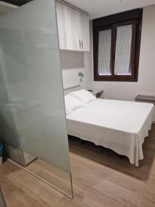 Postel nebo postele na pokoji v ubytování Hotel La Quinta
