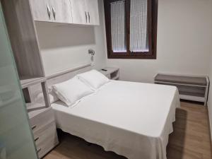 Postel nebo postele na pokoji v ubytování Hotel La Quinta