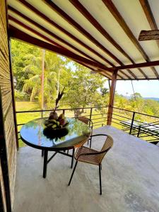A balcony or terrace at Finca en Doradal ( Hacienda Napoles y Rio Claro )