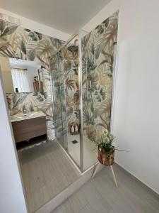 a bathroom with a shower and a sink at Sunset Brucoli in Brucoli +39 photos