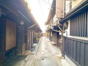 Fotografie z fotogalerie ubytování 祇園の路地奥の京町家 v destinaci Giommachi