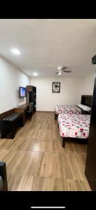 Postel nebo postele na pokoji v ubytování Hotel del Alba Inn & Suites