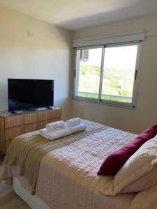 Voodi või voodid majutusasutuse Elegancia y Confort Urbano toas