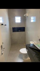 Kúpeľňa v ubytovaní Viçosa Flat