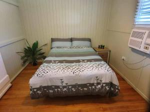 Postel nebo postele na pokoji v ubytování Cute Cottage