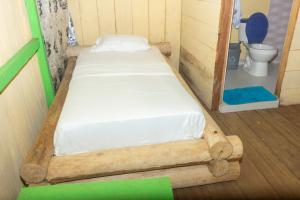 Postel nebo postele na pokoji v ubytování Cabaña Ecoturistica Villa Inesita