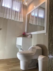 Vannituba majutusasutuses Galápagos Isabela Hotel Loja