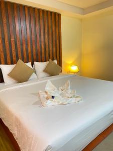Postel nebo postele na pokoji v ubytování Phi Phi Little Star Resort