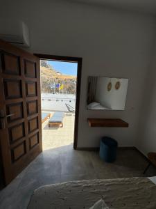 Postel nebo postele na pokoji v ubytování Fedra Apartments Lindos