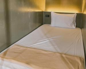 Postel nebo postele na pokoji v ubytování De Coco Hostel Koh Tao