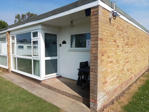 a patio extension to a house at 11 Headwards Retreat in Great Yarmouth