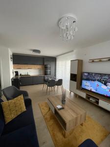 TV a/nebo společenská místnost v ubytování Sonia Apartman
