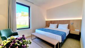 Postel nebo postele na pokoji v ubytování Sól by Privé - Boutique Hotel - Kepi i Rodonit