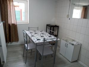 Kuchyň nebo kuchyňský kout v ubytování Direkt am See Ferienwohnungen