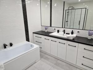 Kúpeľňa v ubytovaní Apartament Mountains Góry Sowie
