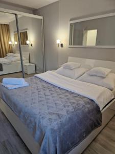 Posteľ alebo postele v izbe v ubytovaní Apartament Mountains Góry Sowie