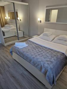 Posteľ alebo postele v izbe v ubytovaní Apartament Mountains Góry Sowie