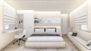 1 dormitorio blanco con 1 cama y 1 silla en Leticia Liveaboard, en Labuan Bajo