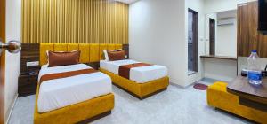 Postel nebo postele na pokoji v ubytování Hotel Nova Blue
