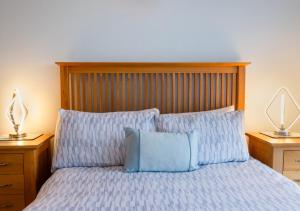 Postel nebo postele na pokoji v ubytování Ocean Breeze