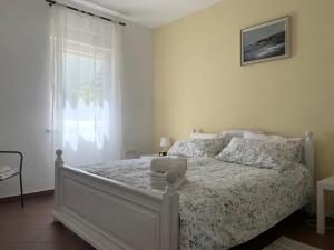 Postel nebo postele na pokoji v ubytování Grand Pool Apartment Ika-Opatija + 37 fotografií