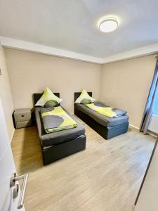 Postel nebo postele na pokoji v ubytování Ferienhaus Dobias