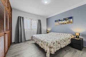 En eller flere senge i et værelse på Casa Nadal - Playa Honda