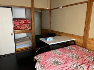 Postel nebo postele na pokoji v ubytování Futago Cabin