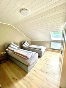 Postel nebo postele na pokoji v ubytování Ferienhaus Dobias